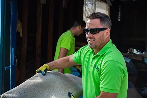 Sean smith hauling away junk carpet