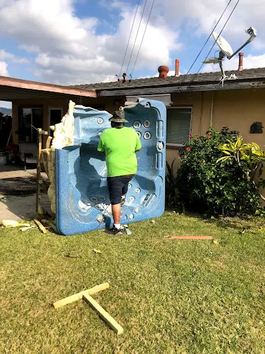 Our Crew Removing Hot Tub