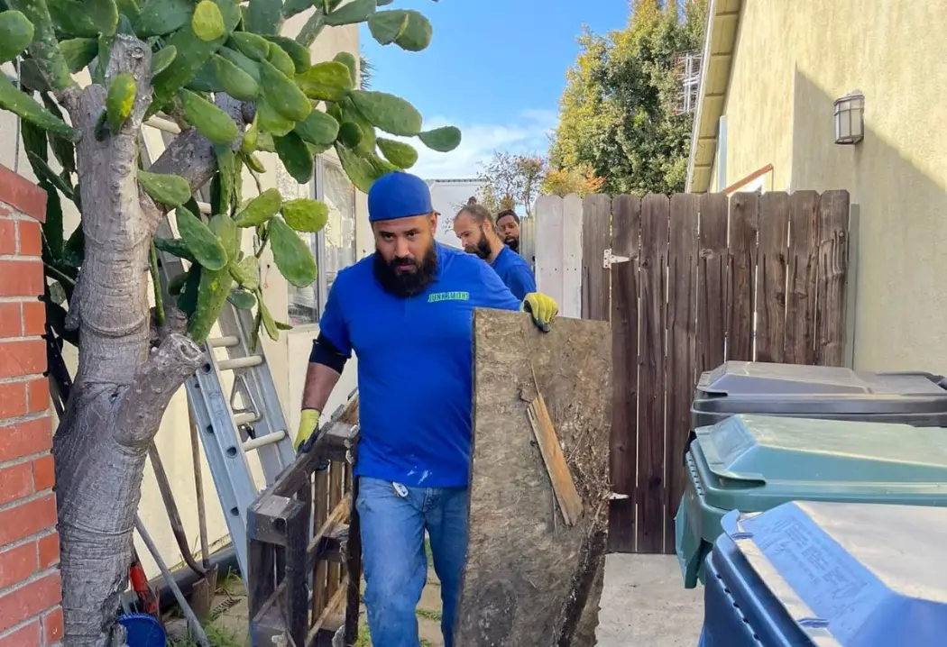 Junk Smiths Crew Removing Pallets